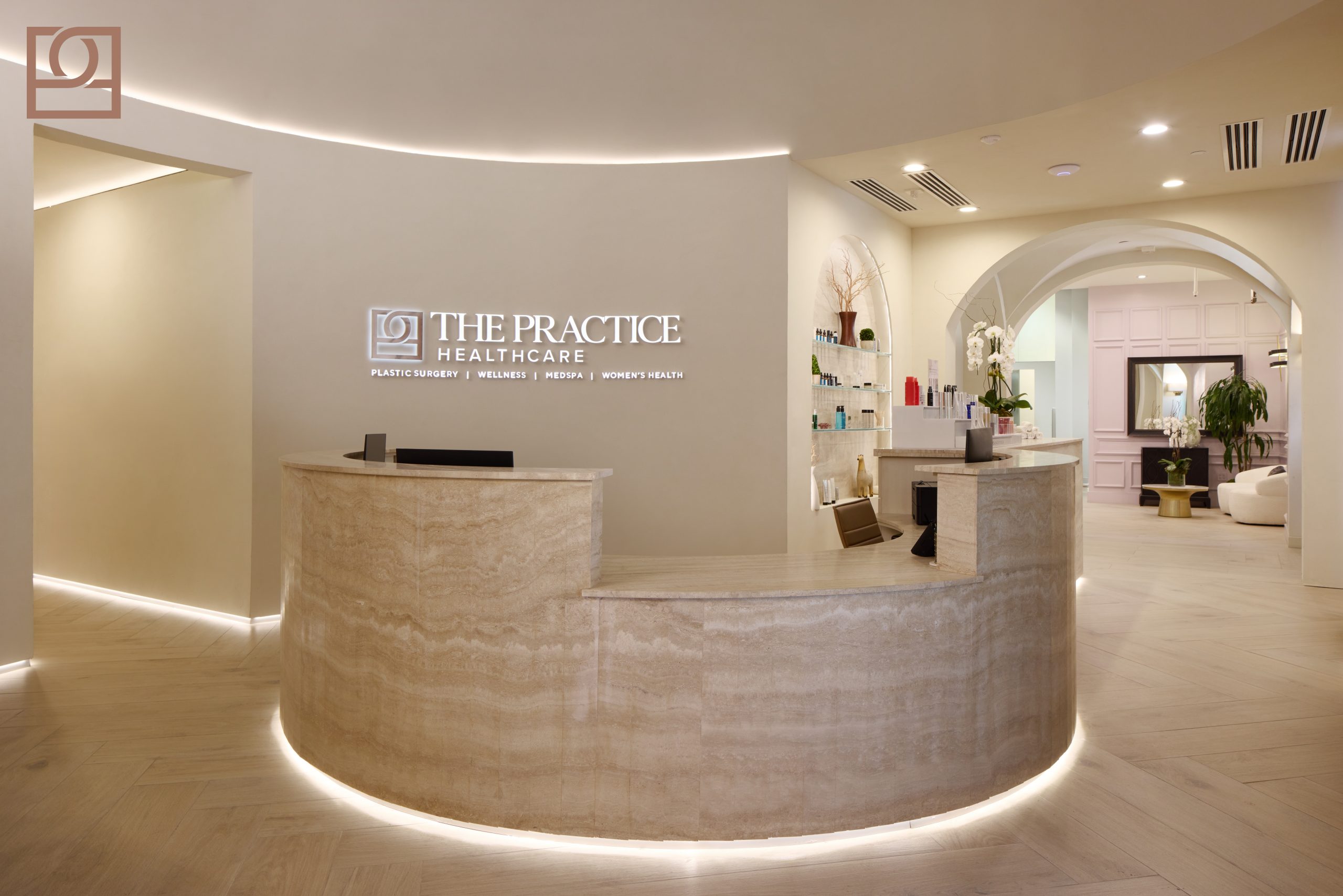 The Practice Healthcare Reception The Practice Healthcare reception lobby with curved travertine welcome desk
